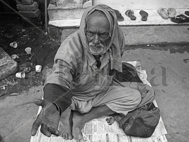 Mendigo en Delhi