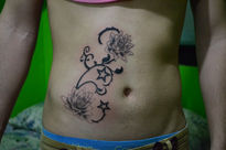 Tattoo de flores de...