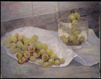 Uvas y vaso con agua